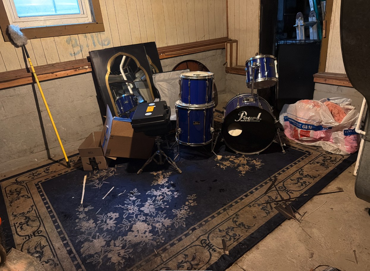 Contents and an area rug sitting in a Category 3 sewage backup in a Louisville basement
